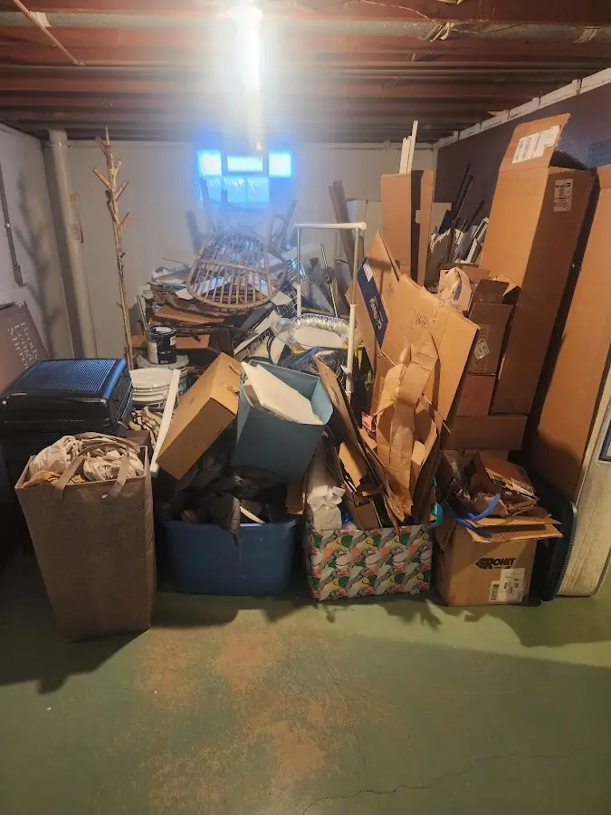 Roll-off dumpster container at job site for Yard Waste Dumpster Rental in Scott